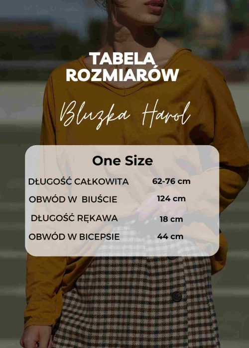 Biała bluzka lniana oversize z krótkim rękawem i ozdobnym ściągaczem z przodu. Lekki model z naturalnego lnu w minimalistycznej stylizacji.