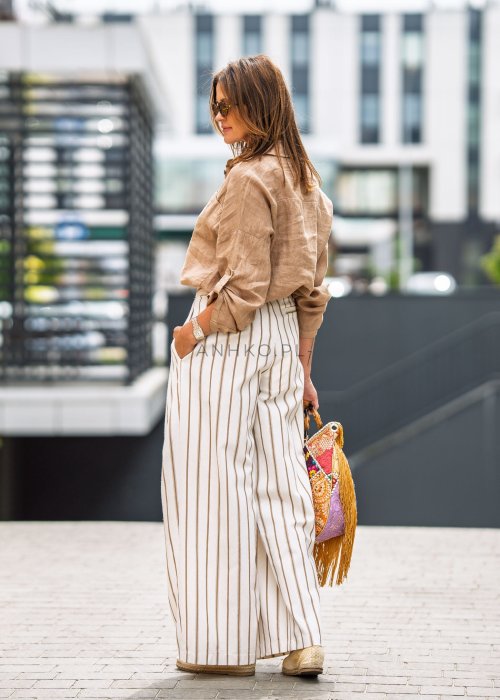 Lniane spodnie damskie w beżowe pasy, szeroka nogawka, wysoki stan, letnia moda boho