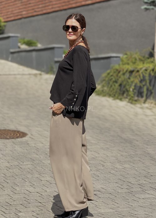 Spodnie eleganckie z gumką w pasie to połączenie wygody i stylu.