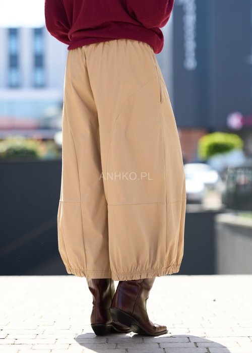 Beżowe spodnie damskie szerokie 7/8 z gumką w pasie, luźny fason, moda damska casual