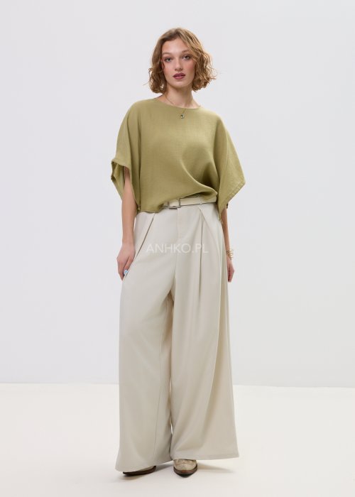 Kremowe spodnie damskie z szeroką nogawką i wysokim stanem, elegancki model z paskiem w talii.